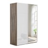 Vista diagonale con ante chiuse Armadio moderno in legno struttura Noce Brera con 2 ante scorrevoli, 1 Bianco Lucido e 1 a Specchio modello Sliding Totò Piccinni