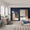 Vista ambientata Libreria classica in legno colore "Cannettato/Cashmere" con 2 ante e 3 vani modello Zefiro Totò Piccinni
