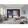 Vista ambientata Cassettiera bassa in legno colore "Cannettato/Cashmere" con 3 cassetti 