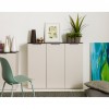 vista frontale ambientata Base Multiuso in legno colore" Cashmere/Effetto Marmo Nero" con 3 ante modello Teca Totò Piccinni