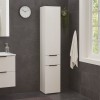 Vista ambientata Colonna Bagno in Legno colore Cashmere/effetto Marmo Nero con 2 ante e 1 cassetto modello Armonia Totò Piccinni