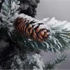 Pigna realistica e rametti imbiancati da neve artificiale di un albero di natale gardena xone