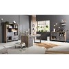 Vista ambientata Libreria design moderna in legno colore "Rovere Invecchiato/Grigio Cemento" con 2 cassetti, 8 vani e 1 ribalta modello Sylva Totò Piccinni