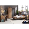 Vista ambientata Letto di design in legno colore "Rovere Artisan/Cemento" modello Sylva Totò Piccinni