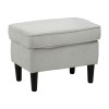 seduta pouf design di colore grigio chiaro di forma rettangolare con piedini altri in legno neri - Lilibet Totò Piccinni