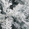 dettaglio fotografico della neve finta su albero di natale artificiale innevato Morgex Totò Piccinni