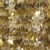 dettaglio addobbi e decori albero di natale oro scintillante pop up totò piccinni fatto con un boa natalizio e stelle di natale
