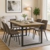 Vista ambientata tavolo allungabile in legno rovere miele con gambe nere modello Kroma Totò Piccinni