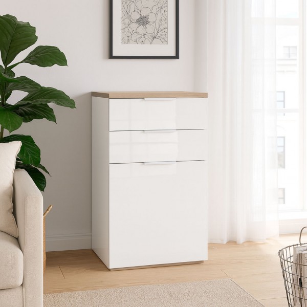 Vista ambientata Comò in legno colore "Bianco/Rovere Riviera" con 2 cassetti e 1 anta modello Orbis Totò Piccinni