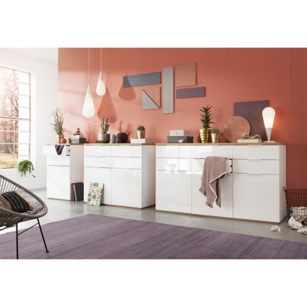 Vista ambientata Cassettiera  in legno colore "Bianco/Rovere Riviera" con 2 cassetti e 1 anta modello Orbis Totò Piccinni