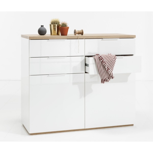 Vista diagonale Mobile contenitore moderno  in legno colore "Bianco Laccato/Rovere Riviera" con 4 cassetti e 2 ante modello Orbis Totò Piccinni