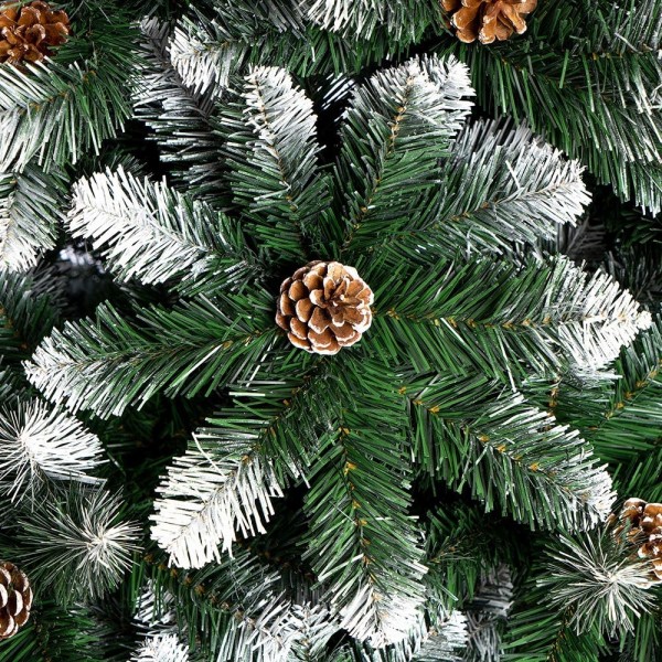 dettaglio albero di natale con pigna e punte innevate Noel Totò Piccinni